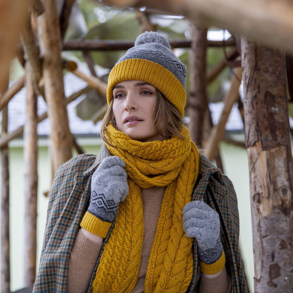 Dents Women’s Jacquard Knitted Bobble Hat with Geometric Pattern