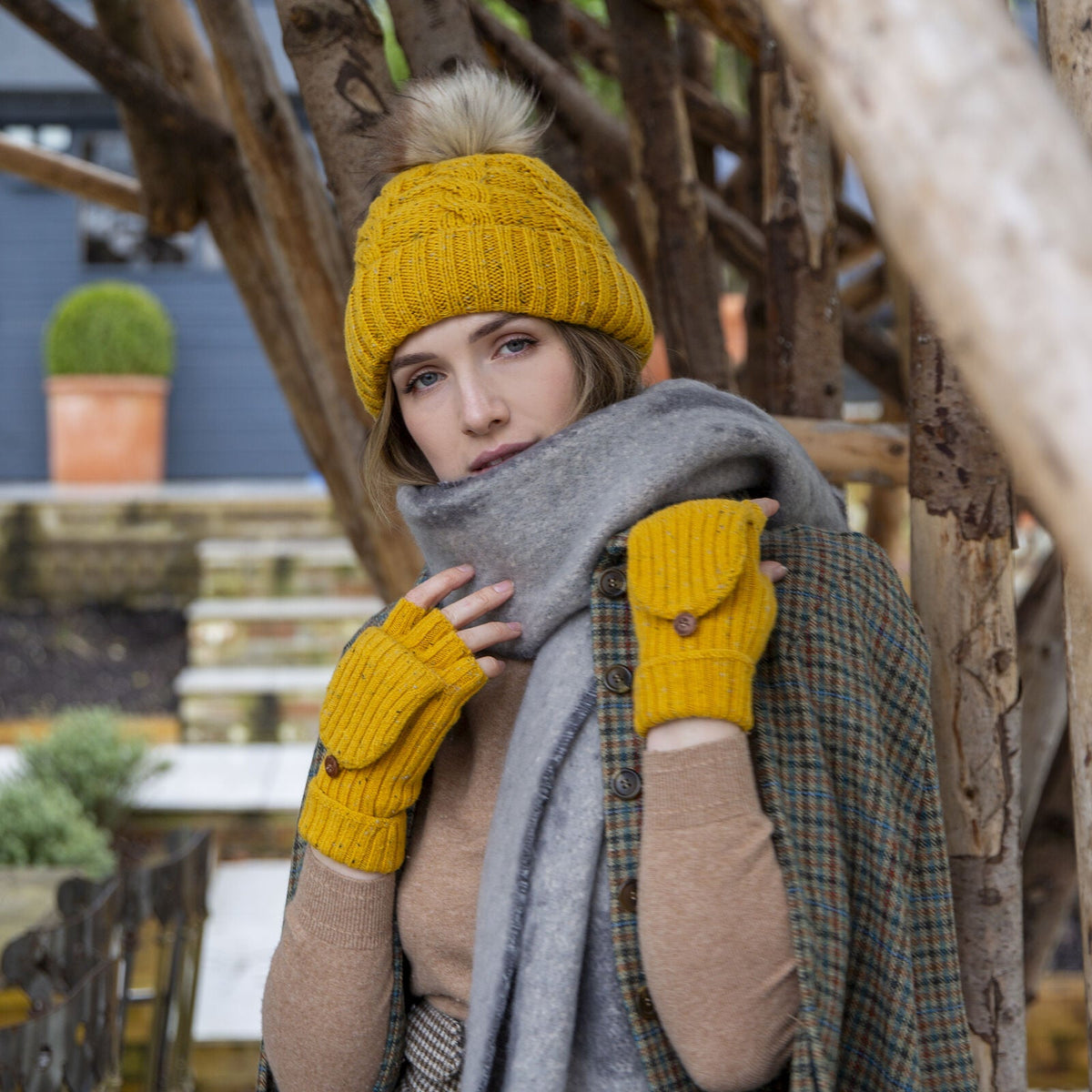 Dents Womens Ribbed Knit Wool Blend Fingerless Gloves with Marl Yarn and Mitten Flap in Ochre